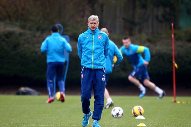 ST ALBANS, ENGLAND - MARCH 16: Arsenal manager Arsene Wenger keeps an eye over the training session during the Arsenal Training Session ahead of their Champions League match against AS Monaco on March 16, 2015 in St Albans, England. (Photo by Charlie Crowhurst/Getty Images)