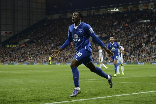 Everton's Belgian striker Romelu Lukaku celebrates scoring Everton's third goal during the English Premier League football match between West Bromwich Albion and Everton at The Hawthorns in West Bromwich, central England, on September 28, 2015.  AFP PHOTO / OLI SCARFF

RESTRICTED TO EDITORIAL USE. No use with unauthorized audio, video, data, fixture lists, club/league logos or 'live' services. Online in-match use limited to 75 images, no video emulation. No use in betting, games or single club/league/player publications.        (Photo credit should read OLI SCARFF/AFP/Getty Images)