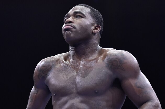 Adrien Broner walks back to his corner during his welterweight boxing bout against Shawn Porter on Saturday, June 20, 2015, in Las Vegas. Porter won by unanimous decision. (AP Photo/David Becker)
