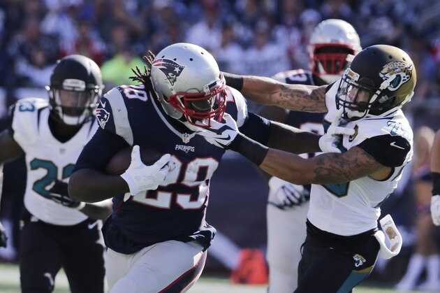 New England Patriots running back LeGarrette Blount (29) rushes against the Jacksonville Jaguars in the second half of an NFL football game, Sunday, Sept. 27, 2015, in Foxborough, Mass. (AP Photo/Charles Krupa)