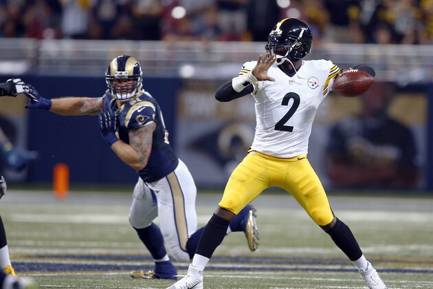 Pittsburgh Steelers quarterback Michael Vick, right, throws under pressure from St. Louis Rams defensive end Chris Long, left, during the fourth quarter of an NFL football game Sunday, Sept. 27, 2015, in St. Louis. (AP Photo/Billy Hurst)