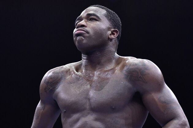 Adrien Broner walks back to his corner during his welterweight boxing bout against Shawn Porter on Saturday, June 20, 2015, in Las Vegas. Porter won by unanimous decision. (AP Photo/David Becker)