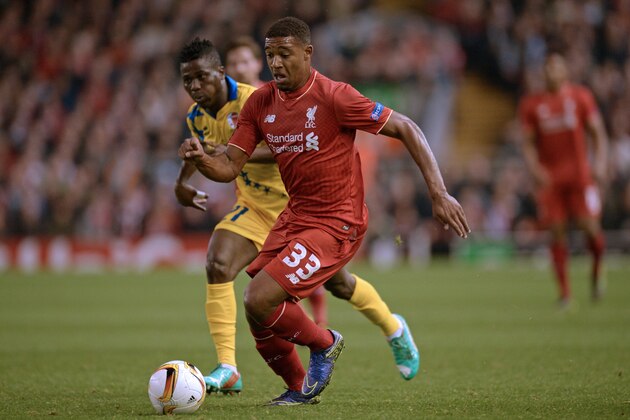 Liverpool's English midfielder Jordon Ibe vies with Sion's Ghanaian striker Ebenezer Assifuah (L) during the UEFA Europa League group B football match between Liverpool and FC Sion at Anfield in Liverpool, north west England on October 1, 2015. AFP PHOTO / OLI SCARFF        (Photo credit should read OLI SCARFF/AFP/Getty Images)