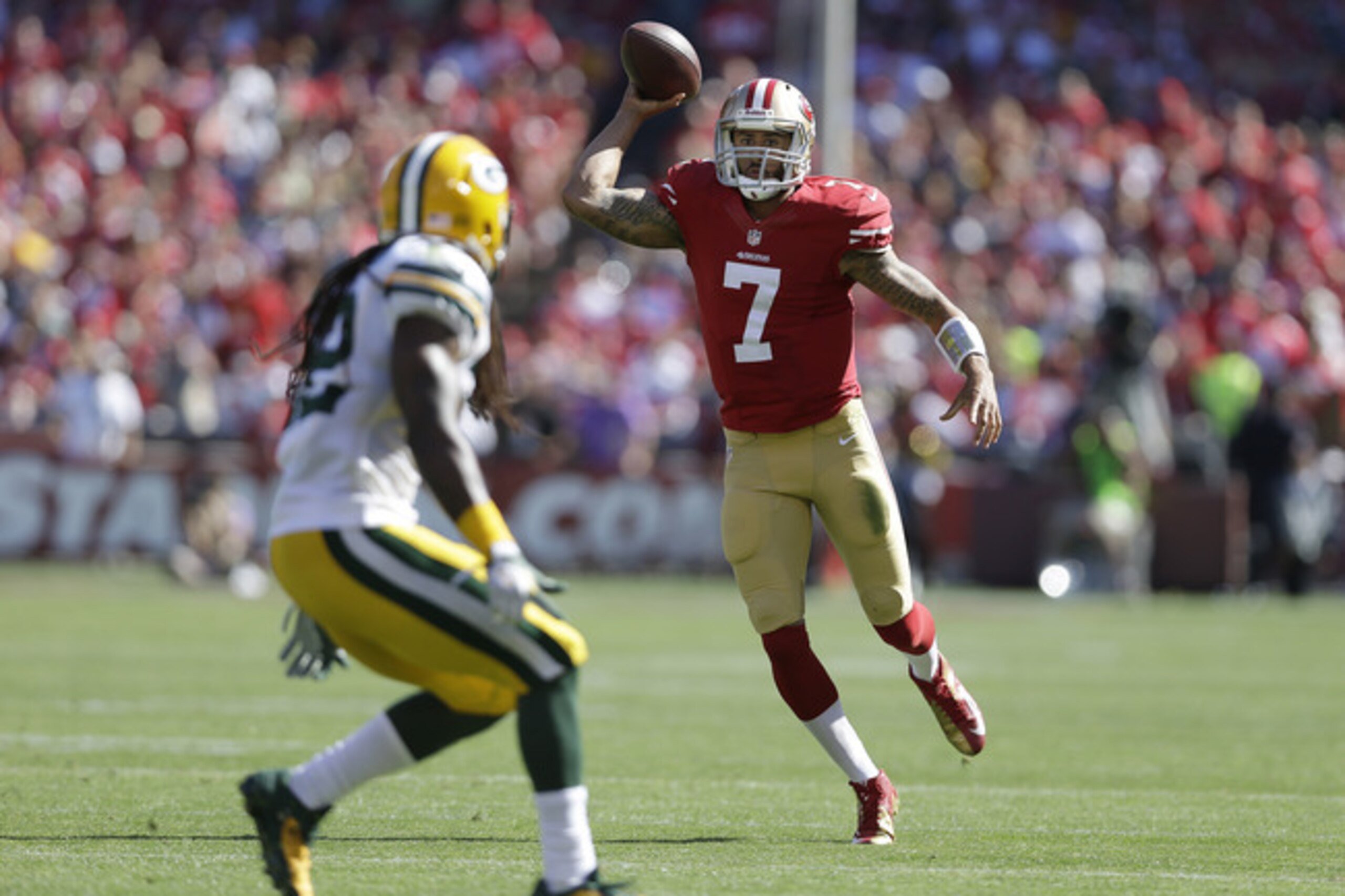San Francisco 49ers quarterback Colin Kaepernick (7) is seen in action against the Green Bay Packers during the second half of an NFL football game in San Francisco, Sunday, Sept. 8, 2013. (AP Photo/Marcio Jose Sanchez)