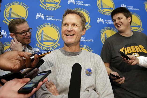 Golden State Warriors head coach Steve Kerr smiles while speaking to reporters at the team's practice facility in Oakland, Calif., Thursday, June 18, 2015. The Warriors believe their first title in 40 years could be the first of many more. With their young core signed long-term and MVP Stephen Curry just entering his prime, the Warriors are certainly set up to make several championship runs. (AP Photo/Jeff Chiu)