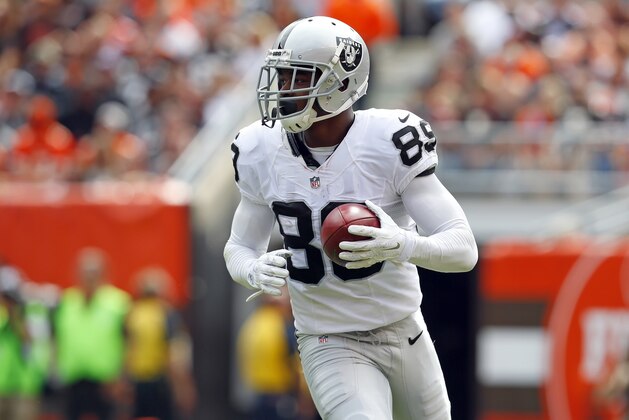 Oakland Raiders wide receiver Amari Cooper (89) runs the ball during an NFL football game against the Cleveland Browns in Cleveland, Sunday, Sept. 27, 2015. (Jeff Haynes/AP Images for Panini)