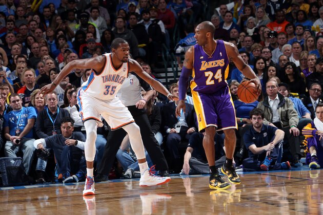OKLAHOMA CITY, OK - MARCH 5:  Kobe Bryant #24 of the Los Angeles Lakers controls the ball against Kevin Durant #35 of the Oklahoma City Thunder on March 5, 2013 at the Chesapeake Energy Arena in Oklahoma City, Oklahoma. NOTE TO USER: User expressly acknowledges and agrees that, by downloading and or using this Photograph, user is consenting to the terms and conditions of the Getty Images License Agreement. Mandatory Copyright Notice: Copyright 2013 NBAE (Photo by Layne Murdoch/NBAE via Getty Images)