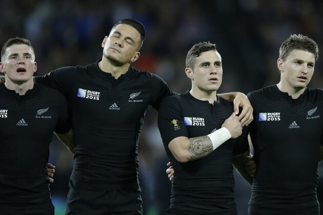New Zealand players line up for the national anthems during the Rugby World Cup Pool C match between New Zealand and Namibia at the Olympic Stadium, London, Thursday, Sept. 24, 2015. (AP Photo/Matt Dunham)