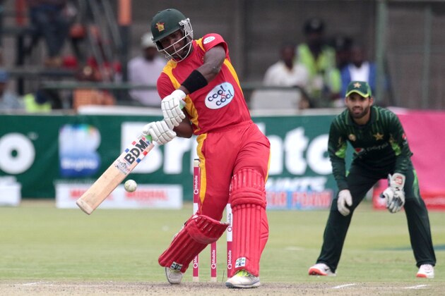 Zimbabwe captain Elton Chigumbura in action during the second of two T20 cricket matches between Pakistan and hosts Zimbabwe at Harare Sports Club,  September 29, 2015. AFP PHOTO / JEKESAI NJIKIZANA        (Photo credit should read JEKESAI NJIKIZANA/AFP/Getty Images)