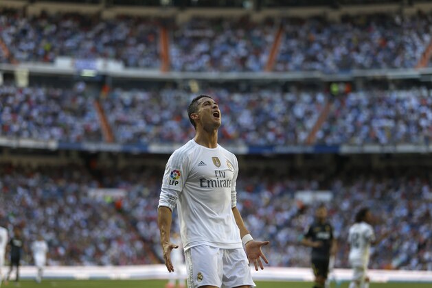 Real Madrid's Cristiano Ronaldo reacts after missing a chance during a Spanish La Liga soccer match between Real Madrid and Granada at the Santiago Bernabeu stadium in Madrid, Saturday, Sept. 19, 2015. Real Madrid won 1-0. (AP Photo/Francisco Seco)