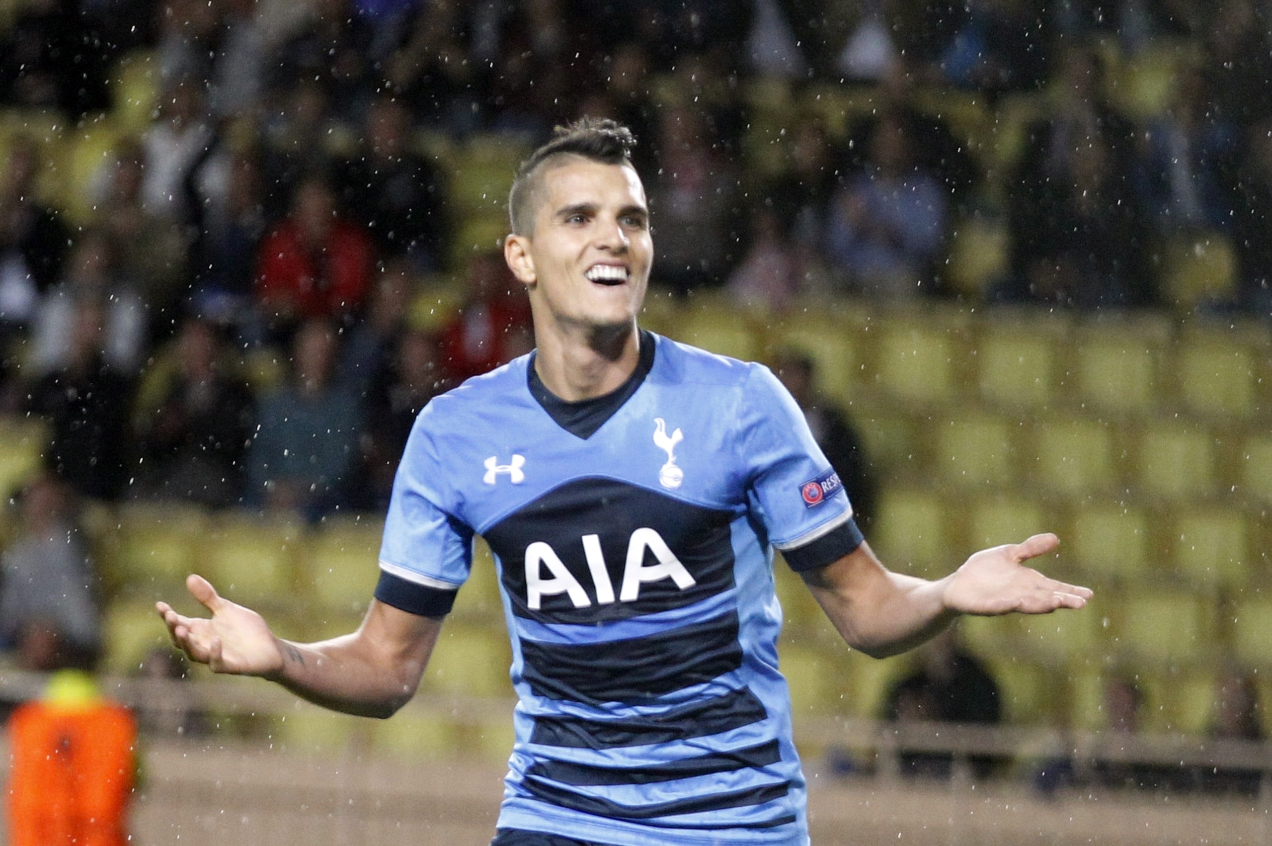 Tottenham's Erik Lamela reacts after scoring the first goal against  Monaco during their Europa League group J soccer match in Monaco stadium, Monaco, Thursday, Oct. 1, 2015. (AP Photo/Lionel Cironneau)