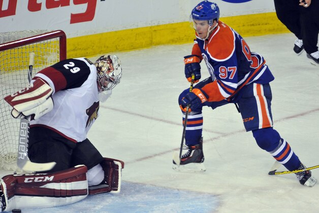 Sep 29, 2015; Edmonton, Alberta, CAN; Arizona Coyotes goalie Anders Lindback (29) stops a shot by Edmonton Oilers center Connor McDavid (97) during the third period at Rexall Place. Oilers won the game 4-0. Mandatory Credit: Walter Tychnowicz-USA TODAY Sports Sep 29, 2015; Edmonton, Alberta, CAN; Arizona Coyotes goalie Anders Lindback (29) stops a shot by Edmonton Oilers center Connor McDavid (97) during the third period at Rexall Place. Oilers won the game 4-0. Mandatory Credit: Walter Tychnowicz-USA TODAY Sports