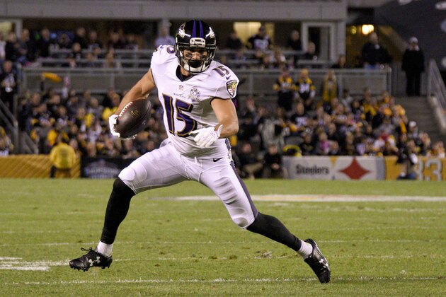 Baltimore Ravens wide receiver Michael Campanaro (15) runs past Pittsburgh Steelers strong safety Will Allen (20) on his way to a touchdown in the first quarter of an NFL football game against the Baltimore Ravens ,Thursday, Oct. 1, 2015 in Pittsburgh. (AP Photo/Don Wright)