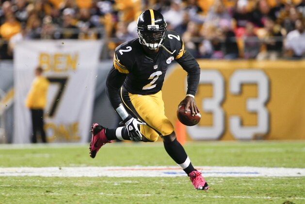 Pittsburgh Steelers quarterback Michael Vick (2) scrambles in the second quarter of an NFL football game against the Baltimore Ravens, Thursday, Oct. 1, 2015 in Pittsburgh. (AP Photo/Gene J. Puskar)