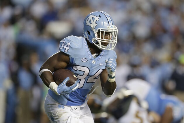 North Carolina's Elijah Hood (34) runs against North Carolina A&T during the first half of an NCAA college football game in Chapel Hill, N.C., Saturday, Sept. 12, 2015. (AP Photo/Gerry Broome)