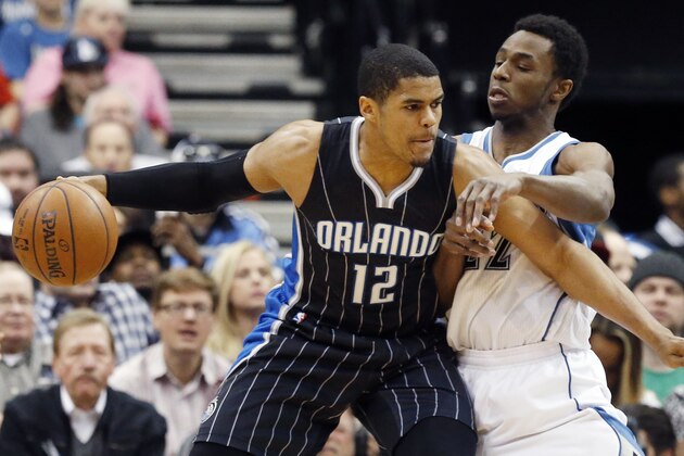 Minnesota Timberwolves’ Andrew Wiggins, right, defends Orlando Magic’s Tobias Harris in the first quarter of an NBA basketball game, Friday, April 3, 2015, in Minneapolis. (AP Photo/Jim Mone)