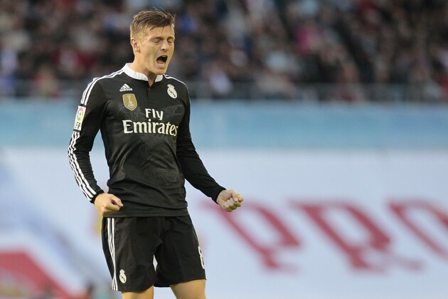 Real Madrid's Toni Kroos from Germany, celebrates after scoring his team's first goal during a Spanish La Liga soccer match between RC Celta and Real Madrid, at the Balaídos stadium in Vigo, Spain, Sunday, April 26, 2015. (AP Photo/Lalo R. Villar)