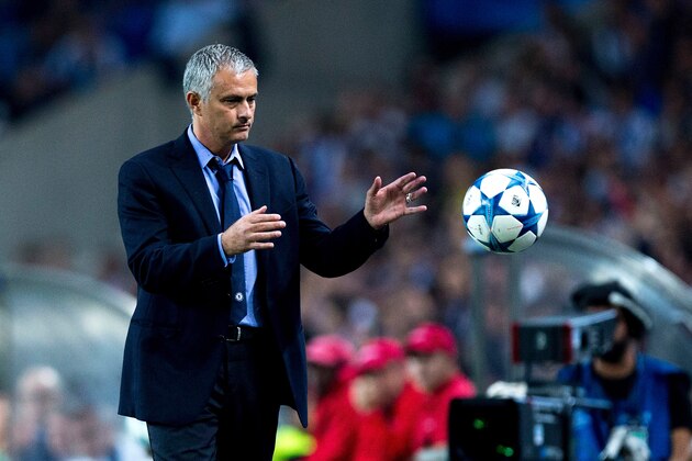 PORTO, PORTUGAL - SEPTEMBER 29:  head coach Jose Mourinho of Chelsea FC holds the ball during the UEFA Champions League Group G match between FC Porto and Chelsea FC  at Estadio do Dragao on September 29, 2015 in Porto, Portugal.  (Photo by Gonzalo Arroyo Moreno/Getty Images)