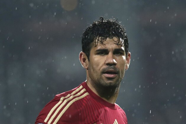 Spain's Diego Da Silva Costa looks at the ball during the Euro 2016 qualifying match in group C, between Luxembourg and Spain, at the Josy Barthel stadium, in Luxembourg City, Luxembourg, Sunday, Oct. 12, 2014. (AP Photo/Yves Logghe)