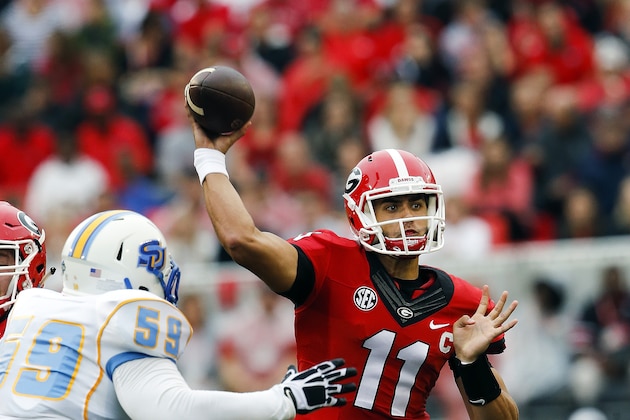 FILE - In this Sept. 26, 2015 file photo, Georgia quarterback Greyson Lambert (11) throw under pressure from Southern defensive lineman Christopher Jones (59) in the first half of an NCAA college football game in Athens, Ga.  The Bulldogs have been in this position before, poised for a championship season, until they faced Alabama. Can No. 8 Georgia finally clear its Crimson Tide hurdle and deal a huge blow to No. 13 Alabama's title hopes. (AP Photo/John Bazemore)