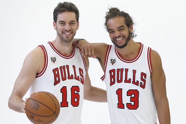 Chicago Bulls' Pau Gasol (16) and Joakim Noah smile for a portrait during an NBA basketball media day Monday, Sept. 28, 2015, in Chicago. (AP Photo/Charles Rex Arbogast)