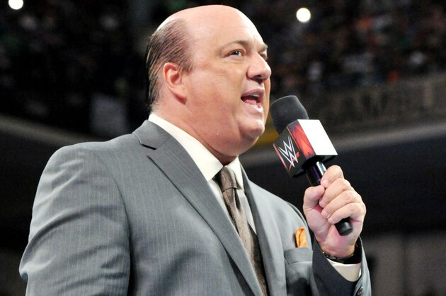 Manager Paul Heyman communicates with Brock Lesnar at Wrestlemania XXXI, on Sunday, March 29, 2015 in Santa Clara, CA. 2015 marks the first year Wrestlemania will be held in the San Francisco Bay Area, being made available to viewers in 177 countries via the WWE Network. (Don Feria/AP Images for WWE)