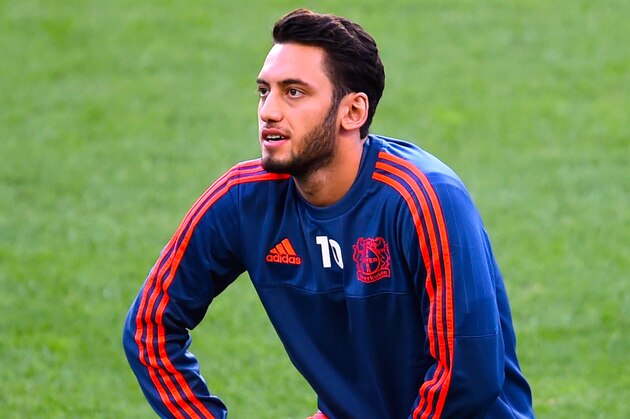 BARCELONA, SPAIN - SEPTEMBER 28:  Hakan Calhanoglu of Bayer 04 Leverkusen looks on during a training session ahead of a UEFA Champions League Group E match against FC Barcelona at the Camp Nou stadium on September 28, 2015 in Barcelona, Spain.  (Photo by David Ramos/Getty Images)