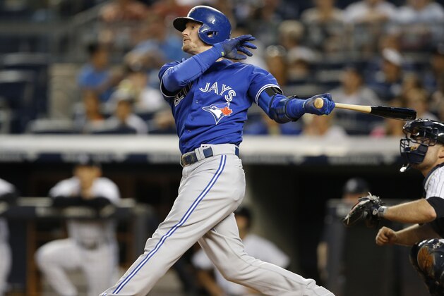 Toronto Blue Jays' Josh Donaldson watches his first-inning, two-run home run off New York Yankees starting pitcher Luis Severino in a baseball game at Yankee Stadium in New York, Friday, Sept. 11, 2015. (AP Photo/Kathy Willens)