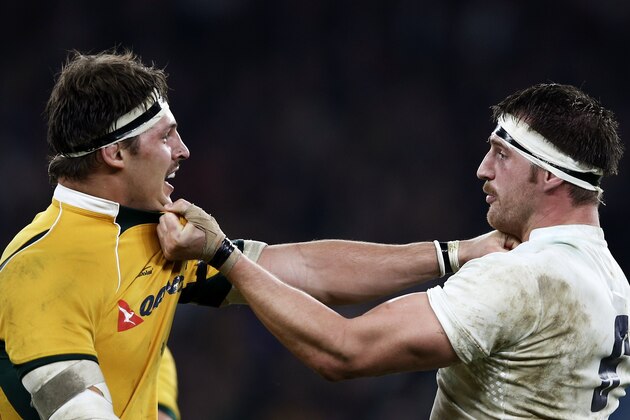 England flanker Tom Wood (R) and Australia's lock Rob Simmons (L) clash during the Autumn International rugby union Test match between England and Australia at Twickenham Stadium, southwest of London on November 29, 2014. England won the game 26-17. AFP PHOTO / ADRIAN DENNIS        (Photo credit should read ADRIAN DENNIS/AFP/Getty Images)