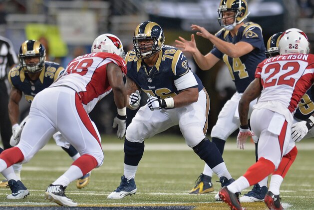 ST. LOUIS, MO - DECEMBER 11:  Rodger Saffold #76 of the St. Louis Rams protects against the Arizona Cardinals at the Edward Jones Dome on December 11, 2014 in St. Louis, Missouri.  (Photo by Michael Thomas/Getty Images)