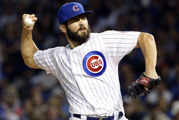 Chicago Cubs starter Jake Arrieta throws against the Pittsburgh Pirates during the first inning of a baseball game Sunday, Sept. 27, 2015, in Chicago. (AP Photo/Nam Y. Huh)