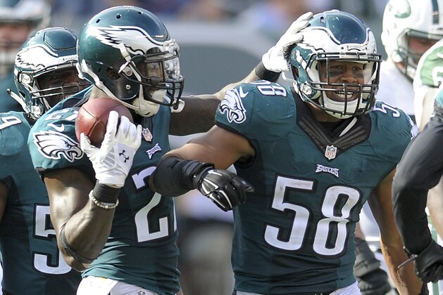 Philadelphia Eagles outside linebacker Jordan Hicks (58) celebrates with teammates after intercepting a pass by the New York Jets during the fourth quarter of an NFL football game, Sunday, Sept. 27, 2015, in East Rutherford, N.J. (AP Photo/Bill Kostroun)