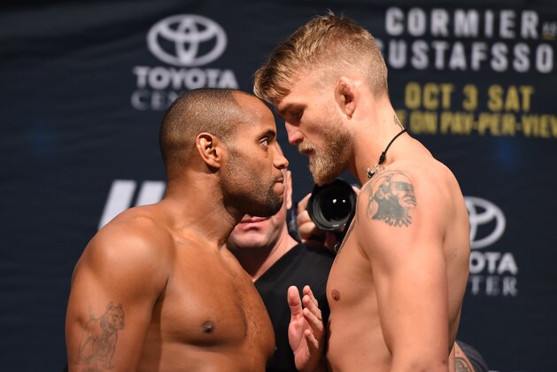 HOUSTON, TX - OCTOBER 02:  UFC light heavyweight champion Daniel Cormier and Alexander Gustafsson face off during the UFC 192 weigh-in at the Toyota Center on October 2, 2015 in Houston, Texas. (Photo by Josh Hedges/Zuffa LLC/Zuffa LLC via Getty Images)