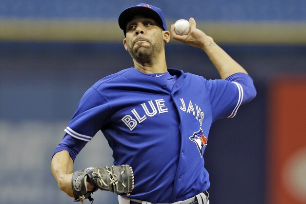 Toronto Blue Jays starting pitcher David Price delivers to Troy Tulowitzki during a simulated game before a baseball game between the Tampa Bay Rays and the Blue Jays Friday, Oct. 2, 2015, in St. Petersburg, Fla.  (AP Photo/Chris O'Meara)