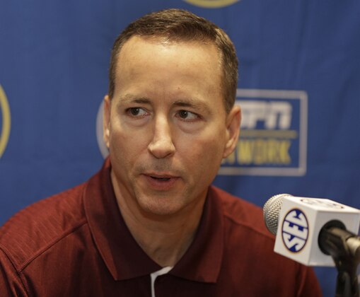 Texas A&M head coach Billy Kennedy answers a question during a news conference at the Southeastern Conference NCAA men's college basketball media day in Charlotte, N.C., Wednesday, Oct. 22, 2014. (AP Photo/Chuck Burton)