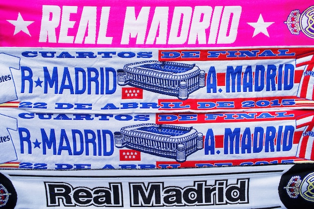 MADRID, SPAIN - APRIL 22:  Scarves for sale prior to the UEFA Champions League quarter-final second leg match between Real Madrid CF and Club Atletico de Madrid at Bernabeu on April 22, 2015 in Madrid, Spain.  (Photo by Gonzalo Arroyo Moreno/Getty Images)