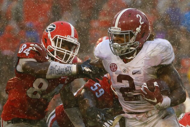 ATHENS, GA - OCTOBER 03:  Derrick Henry #2 of the Alabama Crimson Tide tries to break a tackle by Leonard Floyd #84 of the Georgia Bulldogs at Sanford Stadium on October 3, 2015 in Athens, Georgia.  (Photo by Kevin C. Cox/Getty Images)