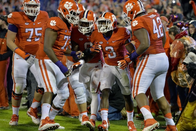 Clemson's Artavis Scott celebrates his touchdown with his teammates during the first half of an NCAA college football game against Notre Dame, Saturday, Oct. 3, 2015, in Clemson, S.C. (AP Photo/Richard Shiro)