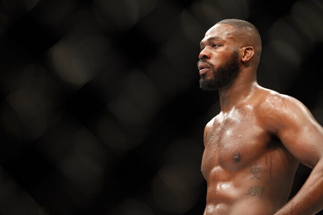 LAS VEGAS, NV - JANUARY 03:  Light heavyweight champion Jon Jones waits in a timeout as he defends his title against Daniel Cormier during the UFC 182 event  at the MGM Grand Garden Arena on January 3, 2015 in Las Vegas, Nevada. Jones retained his title by unanimous decision.  (Photo by Steve Marcus/Getty Images)