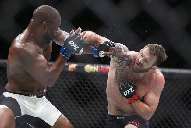 Oct 3, 2015; Houston, TX, USA; Ryan Bader (red gloves) competes against Rashad Evans (blue gloves) during their light heavyweight bout at UFC 192 at Toyota Center. Mandatory Credit: Troy Taormina-USA TODAY Sports