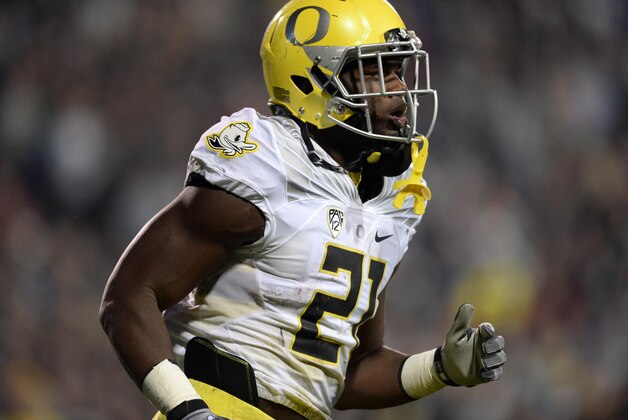 Oct 3, 2015; Boulder, CO, USA; Oregon Ducks running back Royce Freeman (21) following a rushing touchdown in the first quarter against the Colorado Buffaloes at Folsom Field. Mandatory Credit: Ron Chenoy-USA TODAY Sports