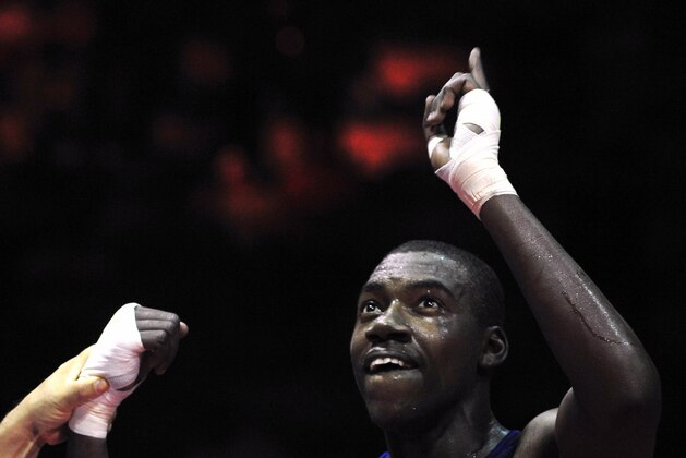 Virgin Island's boxer Julius Jackson celebrates his victory against  Nicaraguan Jhonatan Antonio Davila Castro during their Final Americas Olympic Qualifier fight for the Beijing 2008 Olympic Games, on April 27, 2008 in Guatemala City. AFP PHOTO/Eitan ABRAMOVICH (Photo credit should read EITAN ABRAMOVICH/AFP/Getty Images)
