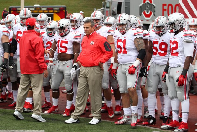 Oct 3, 2015; Bloomington, IN, USA; Ohio State Buckeyes coach Urban Meyer waits to lead his team onto the field before a game against the Indiana Hoosiers at Memorial Stadium. Ohio State defeats Indiana 34-27. Mandatory Credit: Brian Spurlock-USA TODAY Sports