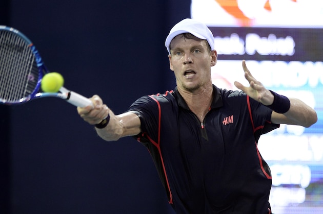 Tomas Berdych of the Czech Republic hits a return against Jiri Vesely of the Czech Republic during their quarter-final match at the Shenzhen Open tennis tournament in Shenzhen, in southern China's Guangdong province on October 2, 2015.      CHINA OUT    AFP PHOTO        (Photo credit should read STR/AFP/Getty Images)