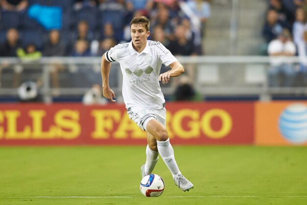 Sep 18, 2015; Kansas City, KS, USA; Sporting Kansas City defender Matt Besler (5) brings the ball down the field at Sporting Park. Mandatory Credit: Gary Rohman/MLS/USA TODAY Sports