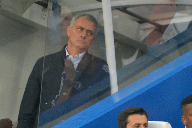Chelsea's Portuguese manager Jose Mourinho (L) reacts during the English Premier League football match between Chelsea and Southampton at Stamford Bridge in London on October 3, 2015. AFP PHOTO / GLYN KIRK

RESTRICTED TO EDITORIAL USE. No use with unauthorized audio, video, data, fixture lists, club/league logos or 'live' services. Online in-match use limited to 75 images, no video emulation. No use in betting, games or single club/league/player publications.        (Photo credit should read GLYN KIRK/AFP/Getty Images)