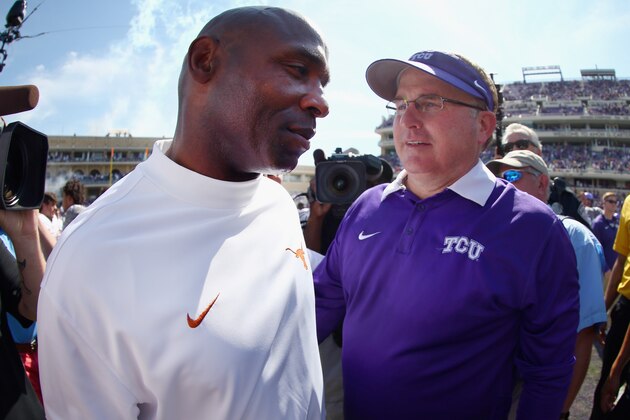FORT WORTH, TX - OCTOBER 03:  Head coach Gary Patterson of the TCU Horned Frogs greets head coach Charlie Strong of the Texas Longhorns at midfield after the Horned Frogs beat the Texas Longhorns 50-7 at Amon G. Carter Stadium on October 3, 2015 in Fort Worth, Texas.  (Photo by Tom Pennington/Getty Images)