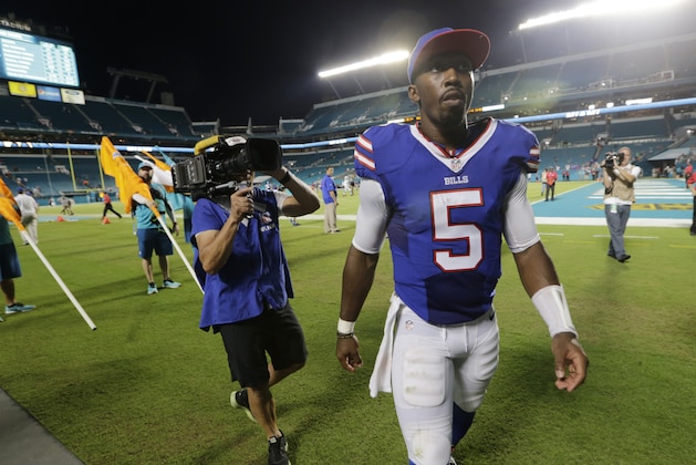 Buffalo Bills quarterback Tyrod Taylor (5) walks off the field at the end of an NFL football game against the Miami Dolphins, Sunday, Sept. 27, 2015 in Miami Gardens, Fla. The Bills defeated the Dolphins 41-14. (AP Photo/Lynne Sladky)