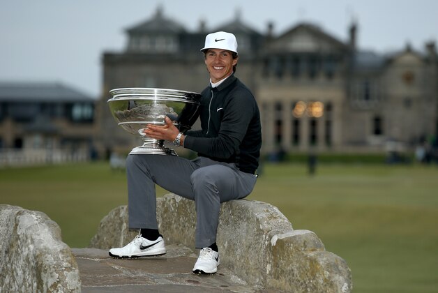 ST ANDREWS, SCOTLAND - OCTOBER 04:  Thorbjorn Olesen of Denmark holds the trophy aloft on the Swilcan Bridge on the 18th hole after victory in the 2015 Alfred Dunhill Links Championship at The Old Course on October 4, 2015 in St Andrews, Scotland.  (Photo by Ian Walton/Getty Images)
