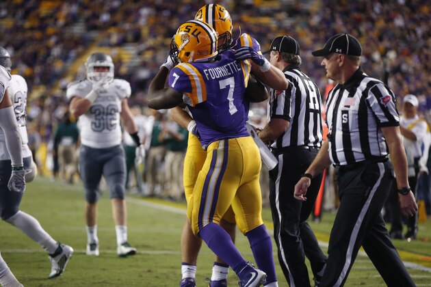 LSU running back Leonard Fournette (7) celebrates his touchdown in the second half of an NCAA college football game against Eastern Michigan in Baton Rouge, La., Saturday, Oct. 3, 2015. LSU won 44-22. (AP Photo/Gerald Herbert)